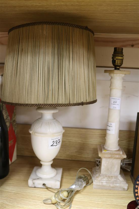 Two Victorian alabaster table lamps, a stationery rack and a pair of globe bookends (5)